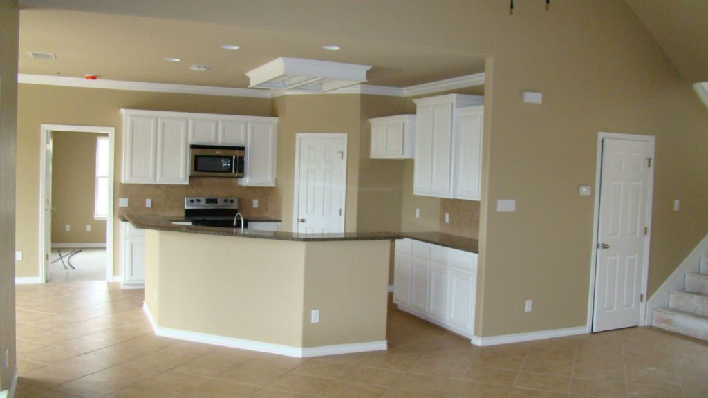 KITCHEN with GRANITE TOPS, SS APPLIANCES, CUSTOM CABINETS